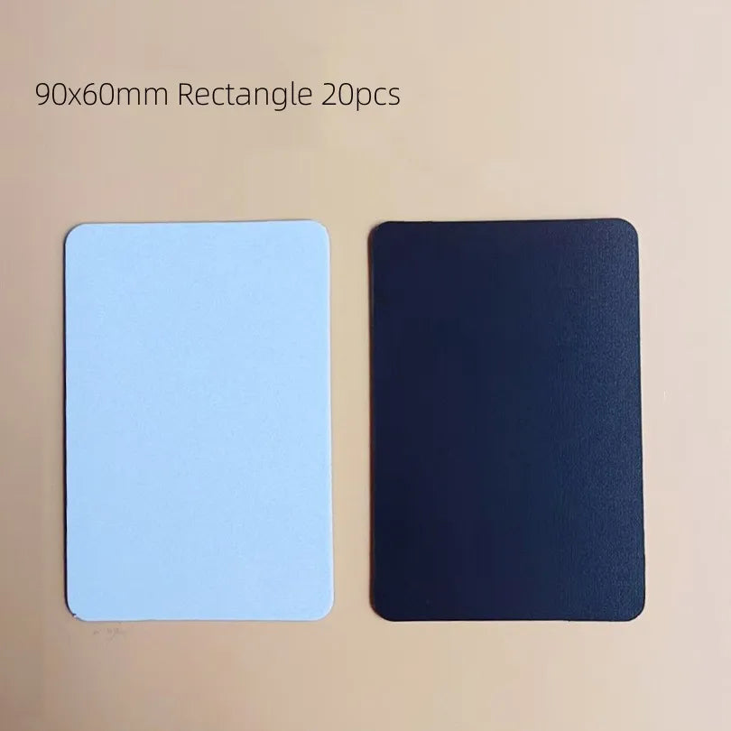 Two rectangular fridge magnets, one light blue and one dark blue, are shown against a beige background.