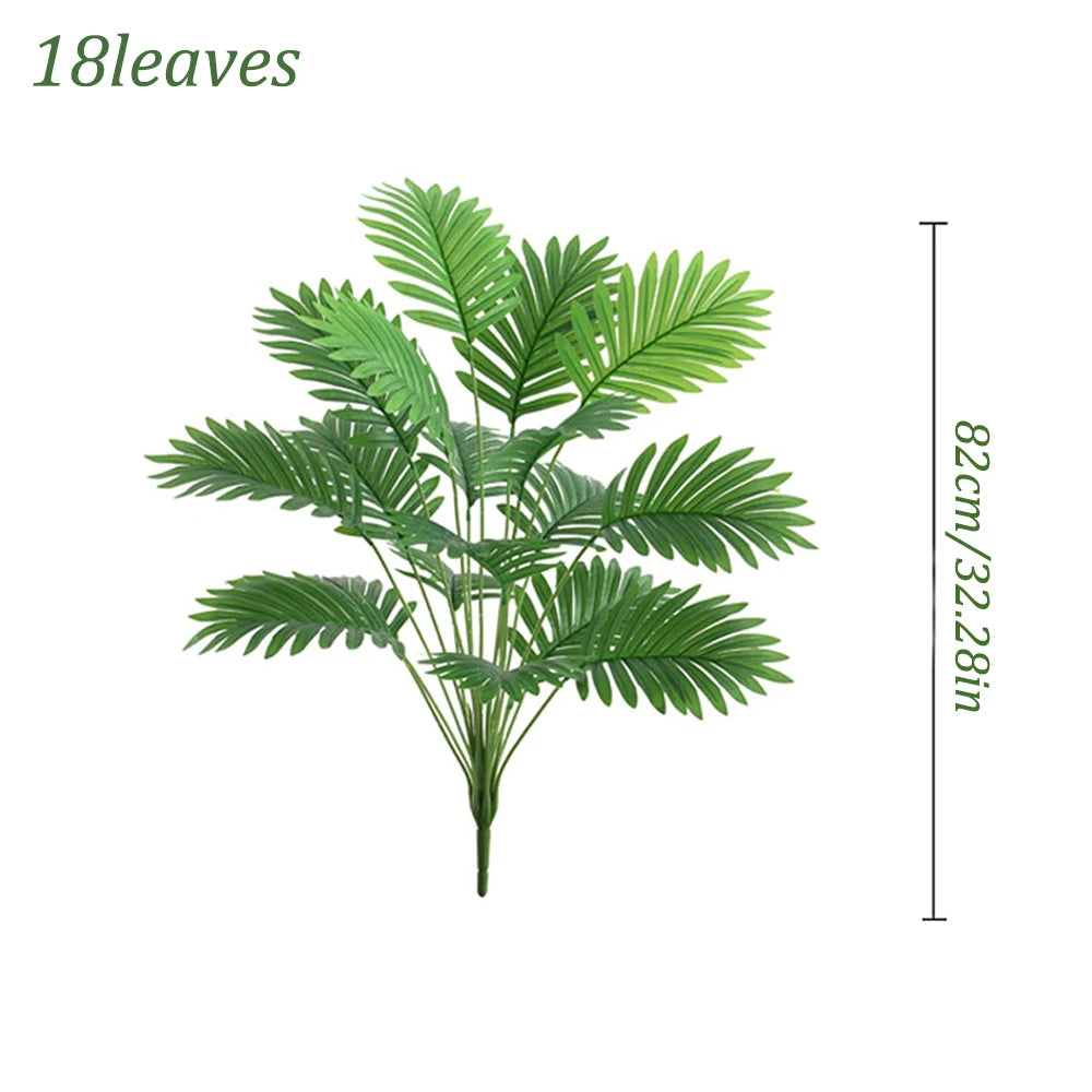 A vibrant green artificial areca palm tree with lush, feathery leaves.