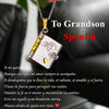 A silver pendant necklace featuring an openable book design with an engraved message and a heart charm.