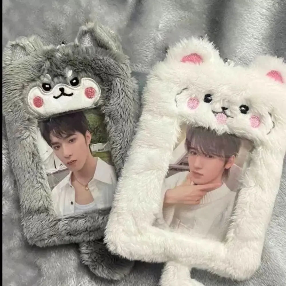 A cute plush photocard holder with a zipper closure featuring two male figures inside.