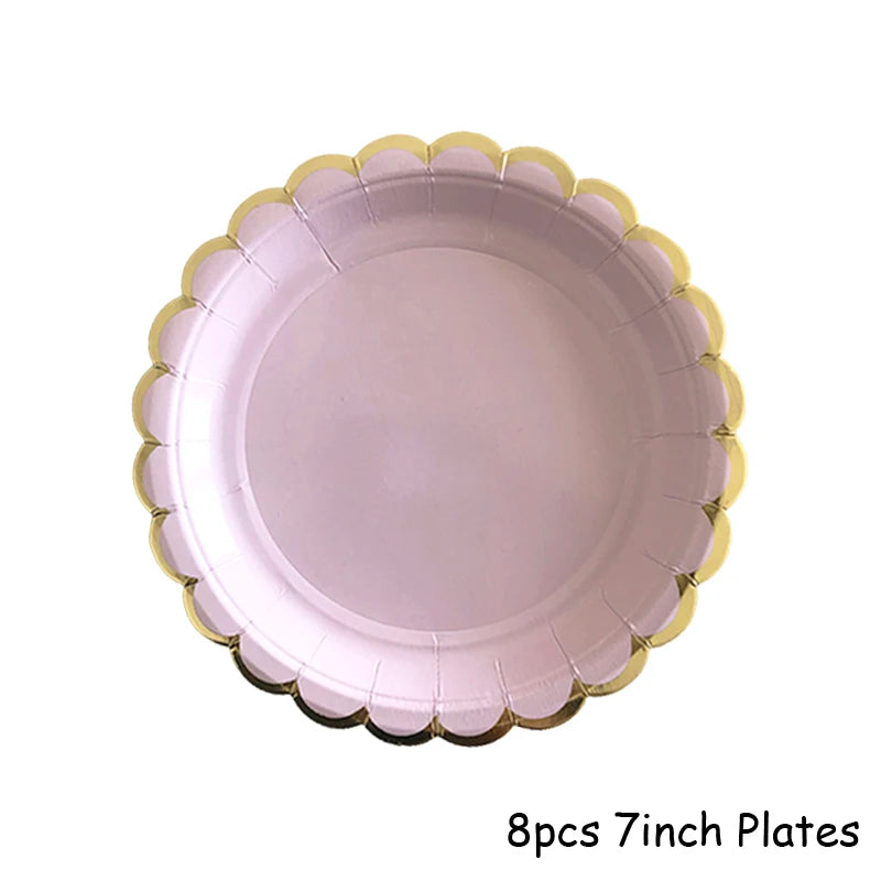 Eight 7-inch plates with a pink and gold scalloped edge for party use