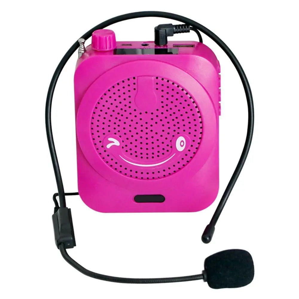 A pink wired headset microphone with a flexible black cable and an earphone.
