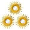 A set of three gold sunflower wall mirrors with circular reflective surfaces.