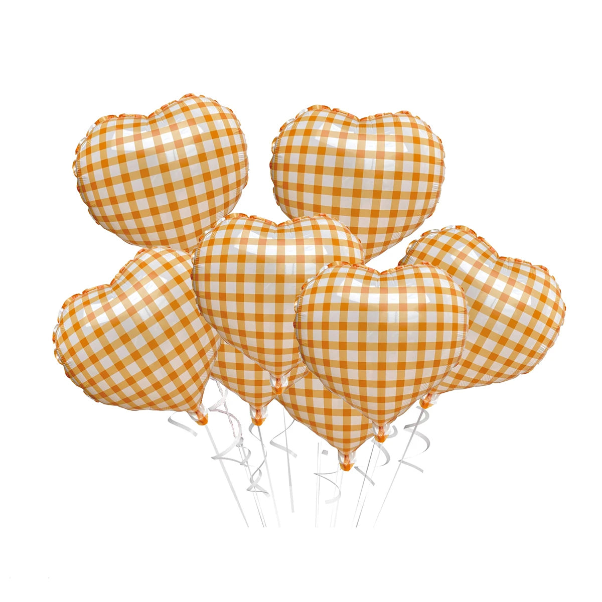 A cluster of orange and white checkered heart-shaped foil balloons.