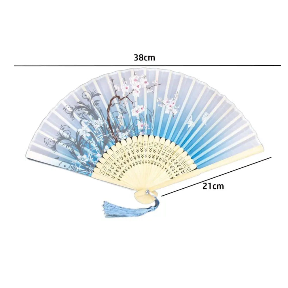 Antique style bamboo folding hand fan with blue and white floral patterns