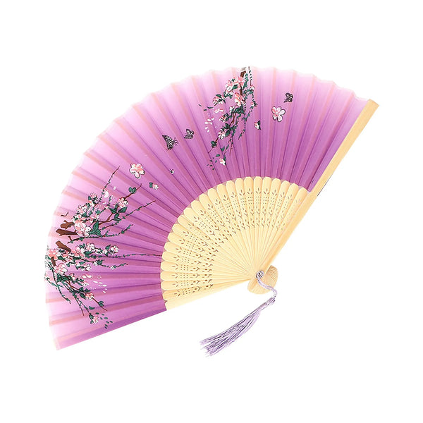 A pink and yellow vintage bamboo folding fan decorated with floral accents.