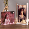 A clear acrylic magnetic photo frame displaying a portrait of a girl with her hair tied in a bow.