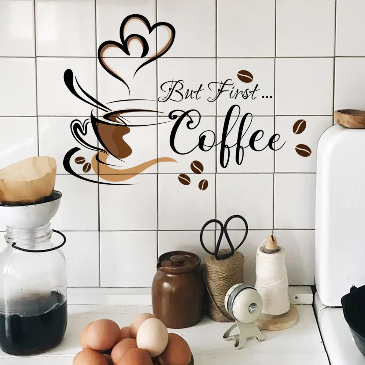 A wall sticker set featuring a coffee cup design on white tiles, with loose coffee beans and eggs nearby.