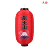 A red paper hanging lantern featuring Mount Fuji and a rising sun design.