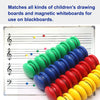 A set of ten colorful refrigerator magnets arranged in a row.