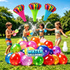 A group of happy children playing with colorful water balloons outdoors on a grassy field.