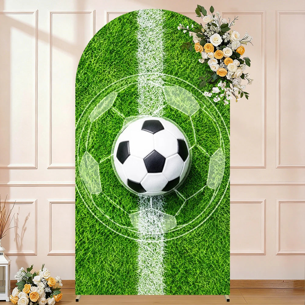 A vibrant green artificial soccer field backdrop with a white goal line and a football in the center, decorated with white fl