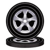 A set of black and silver racing wheels for a birthday party decoration.