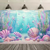 A vibrant underwater scene featuring colorful coral, sea plants, and iridescent shells for a mermaid tail birthday backdrop.