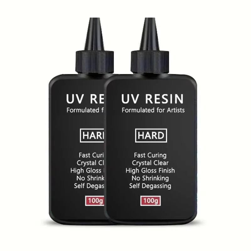 Black UV resin bottle labeled HARD formulated for artists with details on curing and shrinking properties