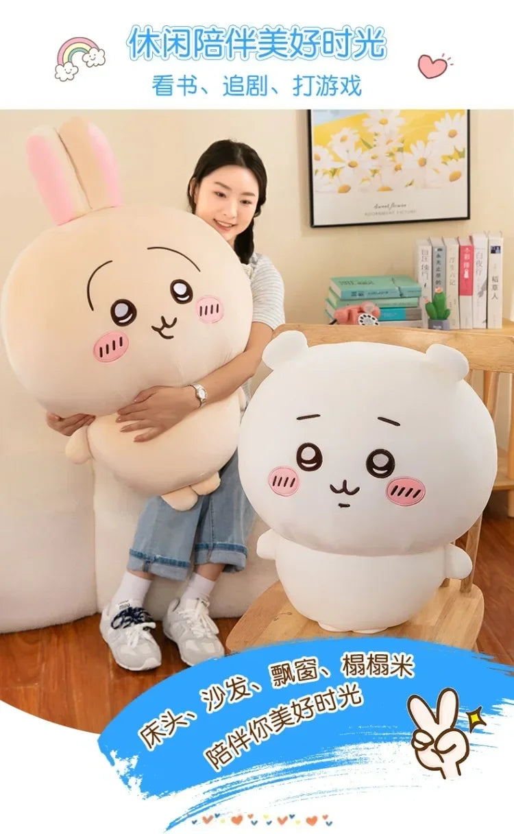 A soft white Usagi Chiikawa plush doll is shown next to a white bear plush doll, displayed in a bright, cheerful setting.