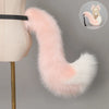 A pink faux fur fox tail and ear costume set displayed on a mannequin.
