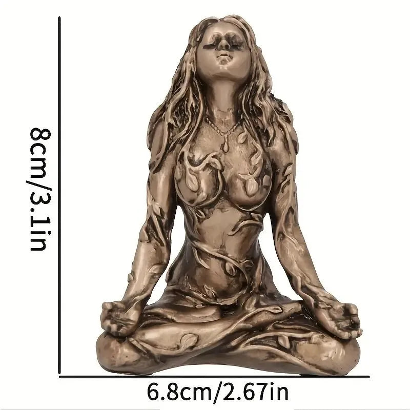 A bronze-colored statue of a female figure with long flowing hair in a meditative pose.