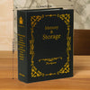 A black photo album with gold foil detailing, titled Memory & Storage.