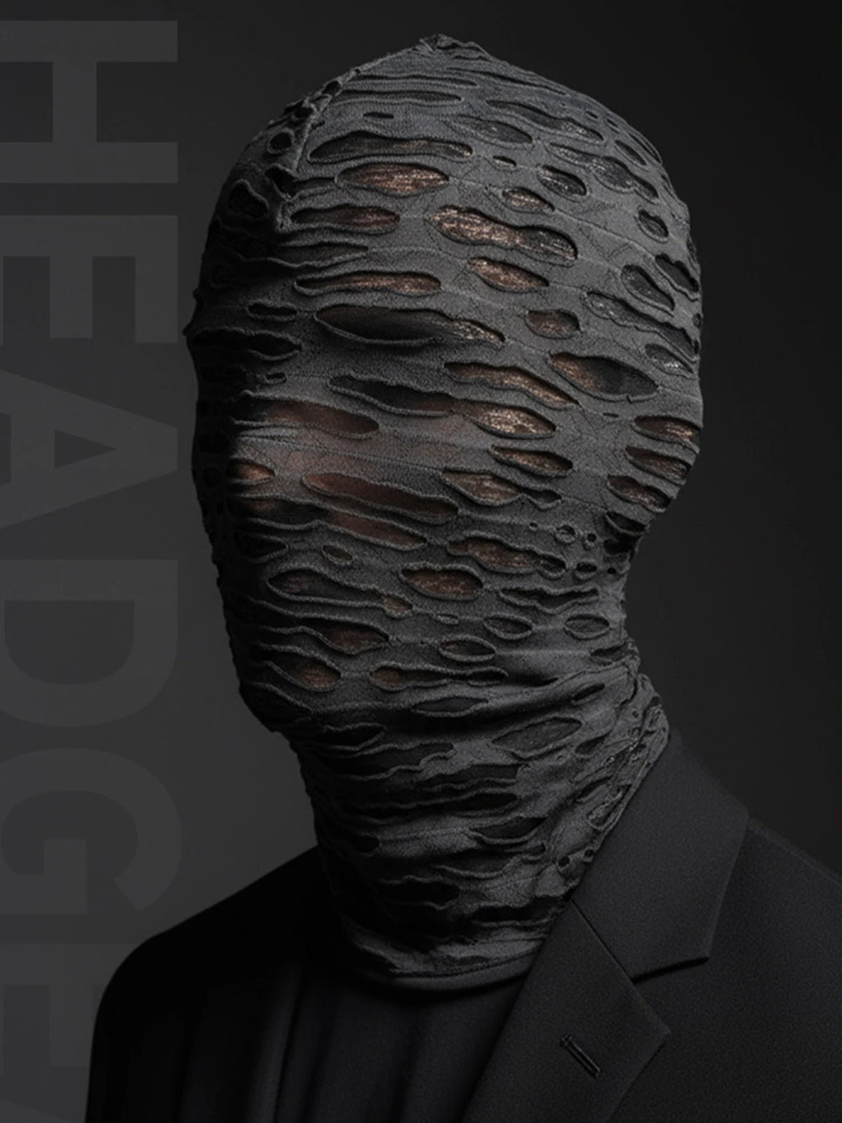 A close-up of a black mesh balaclava face mask worn on a person's head.