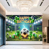 A vibrant football themed birthday backdrop featuring a soccer ball, trophies, and crowns on a green field.
