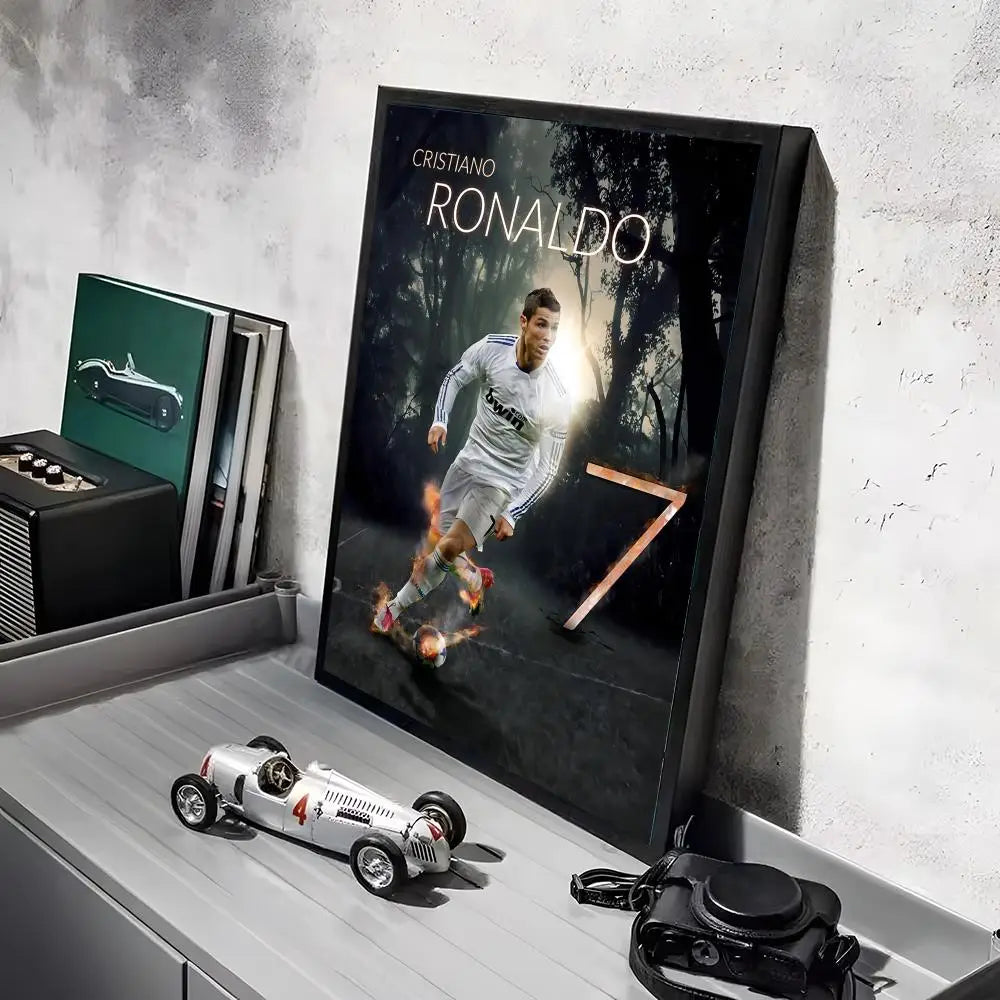 A framed canvas art poster featuring a dynamic image of Ronaldo in a white jersey and shorts, with a vintage car model displa