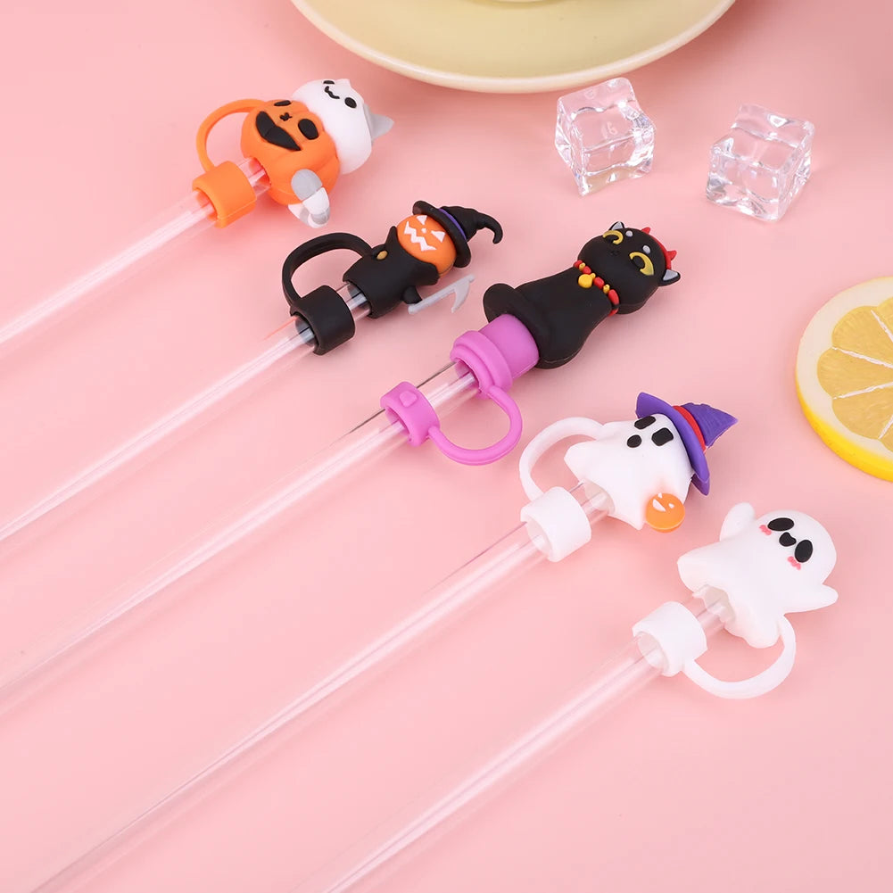 Reusable silicone straw covers shaped like Halloween animals, including a pumpkin, cat, and ghost.