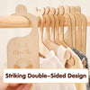 Wooden baby closet dividers with a rainbow cloud design for organizing baby clothes