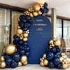 A balloon garland featuring metallic gold and navy blue balloons decorating a backdrop for a birthday party.