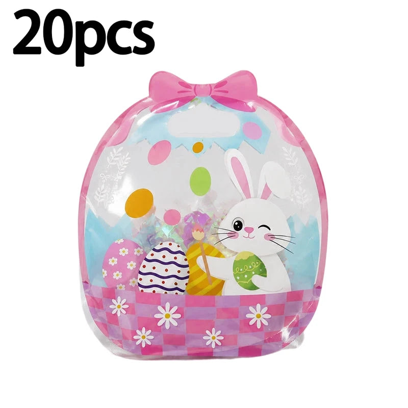 A clear plastic bag filled with 20 Halloween pumpkin witch treat bags featuring a white rabbit design and pink accents.