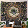 Bohemian mandala tapestry wall hanging featuring intricate geometric patterns in purple, gold, and green tones.