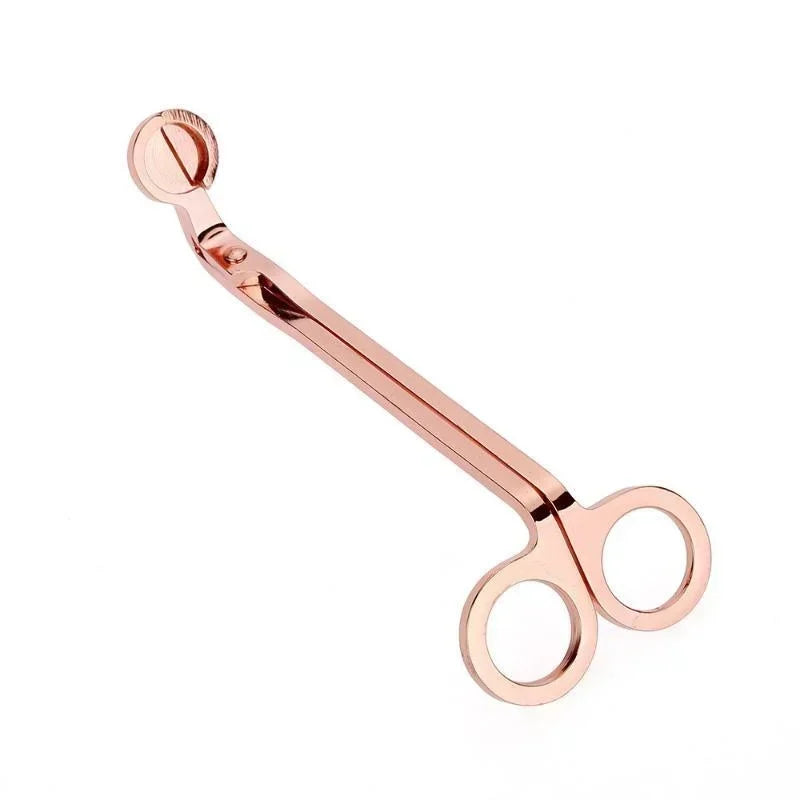 A pair of rose gold stainless steel candle wick trimmer scissors shown against a white background.