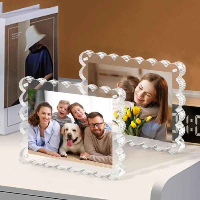 A magnetic acrylic photo display frame showing a family smiling in a mirror reflection.