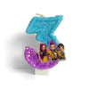 A custom birthday candle featuring three characters from a movie set against a blue glitter background.