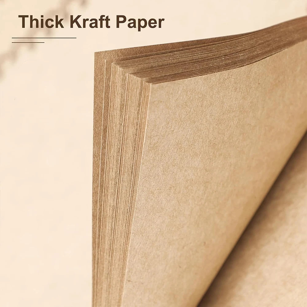 A close-up view of thick kraft paper sheets bound together, showing the texture and thickness of the paper.