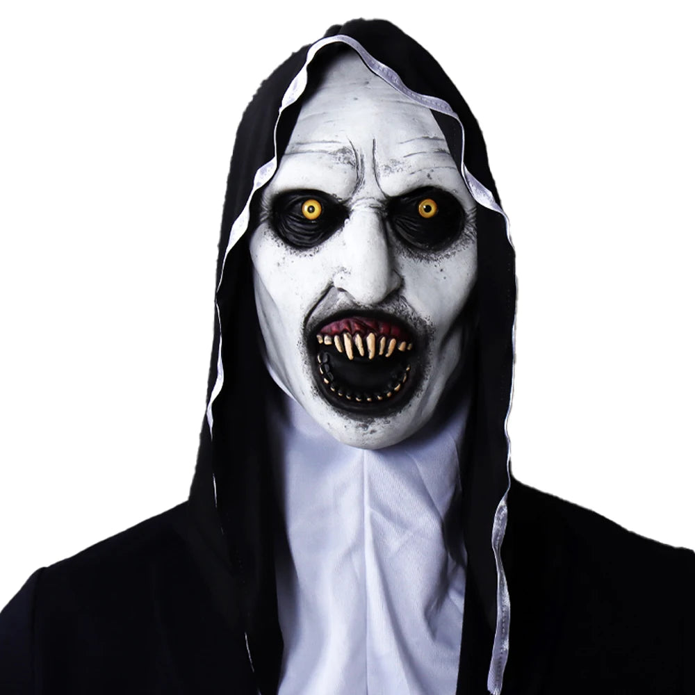 A realistic horror nun latex mask with pale skin, black hood, and glowing yellow eyes.