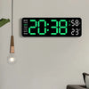 A digital wall clock displaying 20:38, 58% humidity, and 23 degrees Celsius on a light gray wall.
