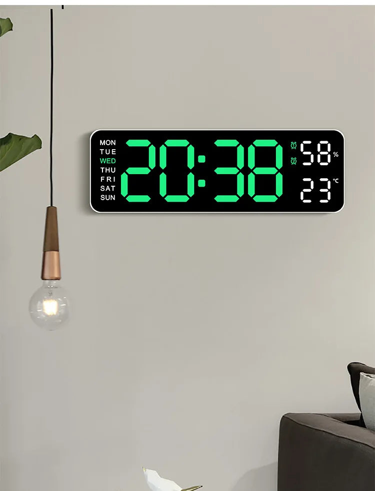 A digital wall clock displaying 20:38, 58% humidity, and 23 degrees Celsius on a light gray wall.