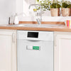 A white dishwasher with a green CLEAN magnet sign installed on the front panel.