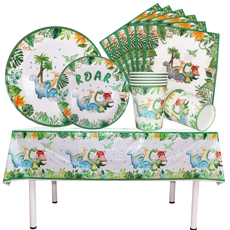 A green and white dinosaur party disposable tableware set including plates, cups, and a banner for a table.