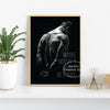 A black and white canvas print featuring a muscular man exercising against a dark background.