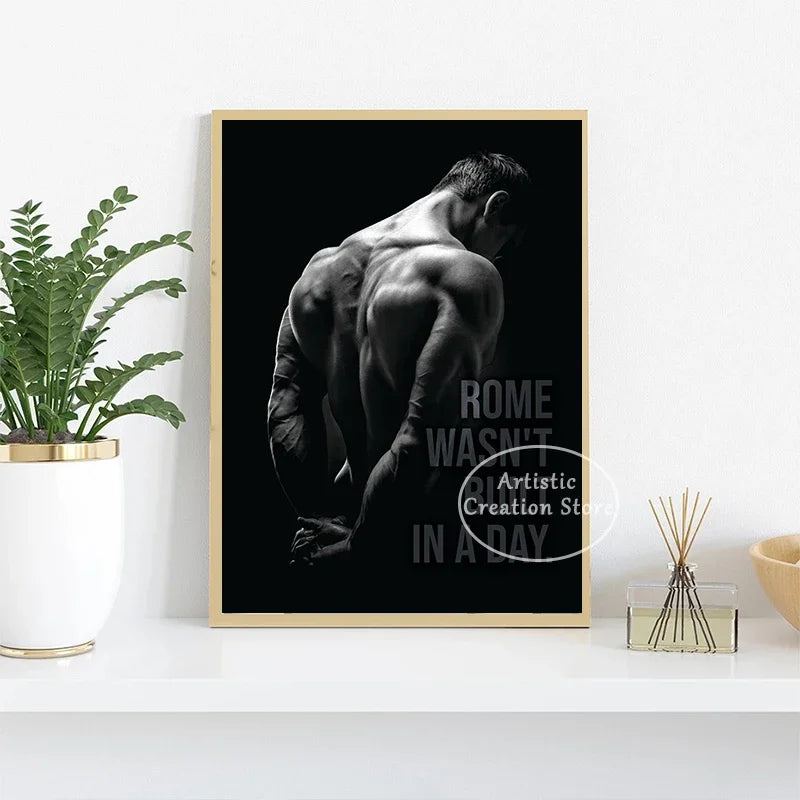 A black and white canvas print featuring a muscular man exercising against a dark background.