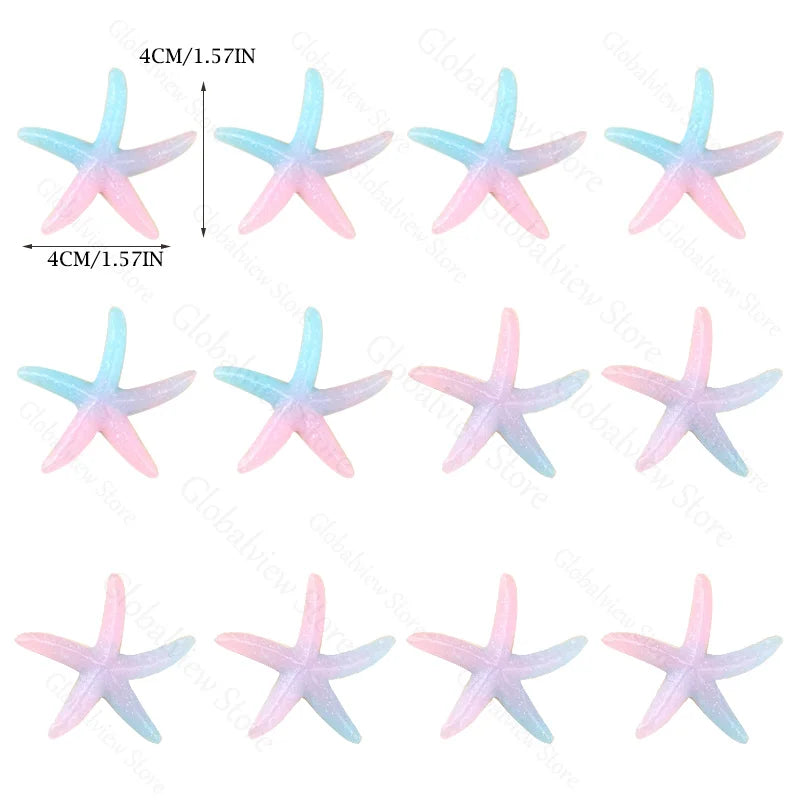 A set of mermaid tail cake toppers featuring sea star and seashell decorations in pink and light blue.