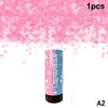 A pink confetti cannon product with a blue and white design against a background of pink confetti.