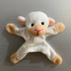 A white plush toy resembling a baby elephant with pink accents and floppy ears.