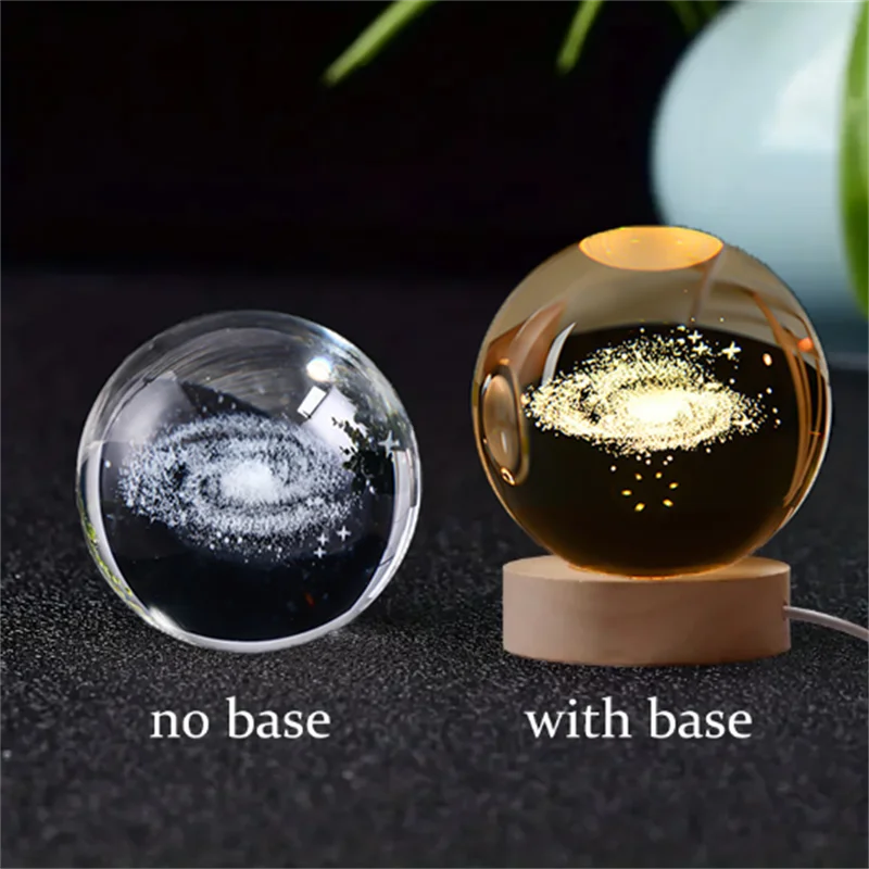 A comparison of a 3D crystal ball night light without a base and with a wooden base.
