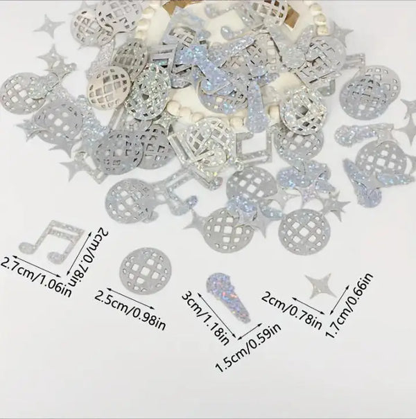 A collection of silver and iridescent glitter confetti pieces for disco parties