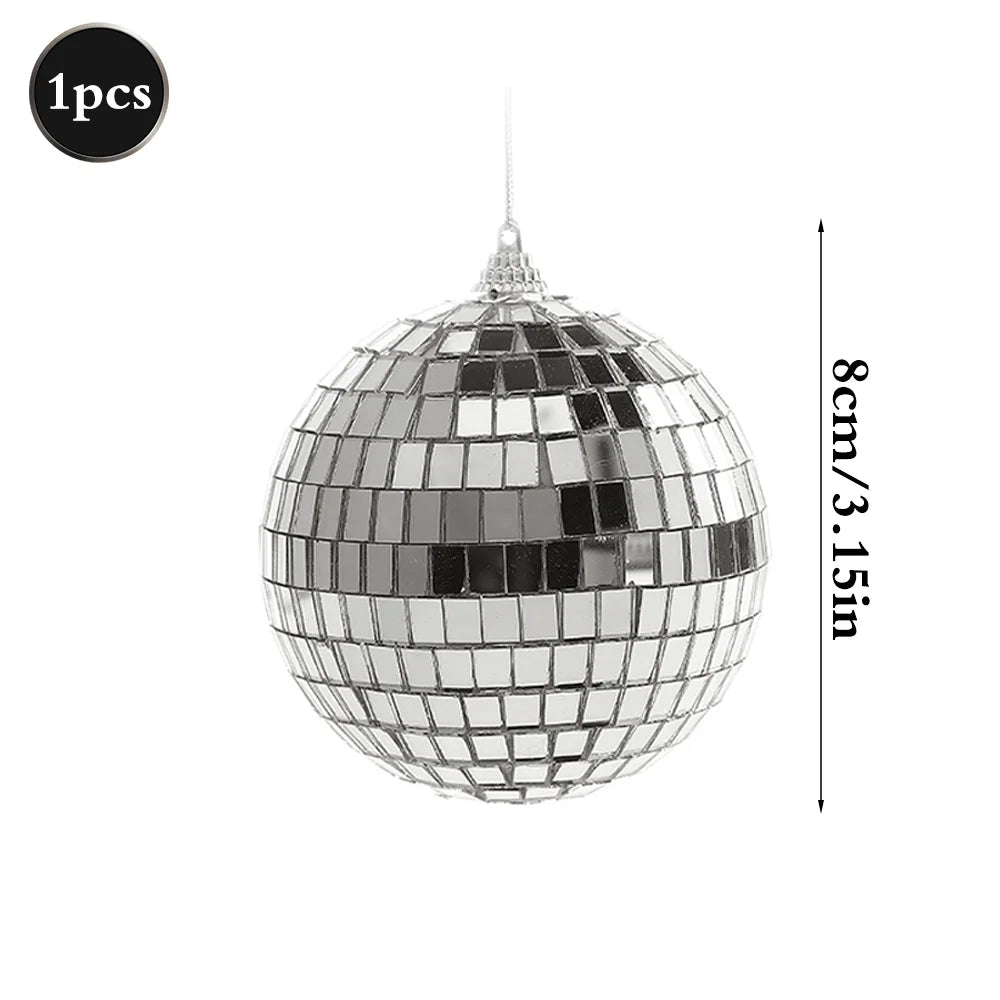 Silver disco mirror ball sphere with a pointed top, measuring 8cm/3.15in.