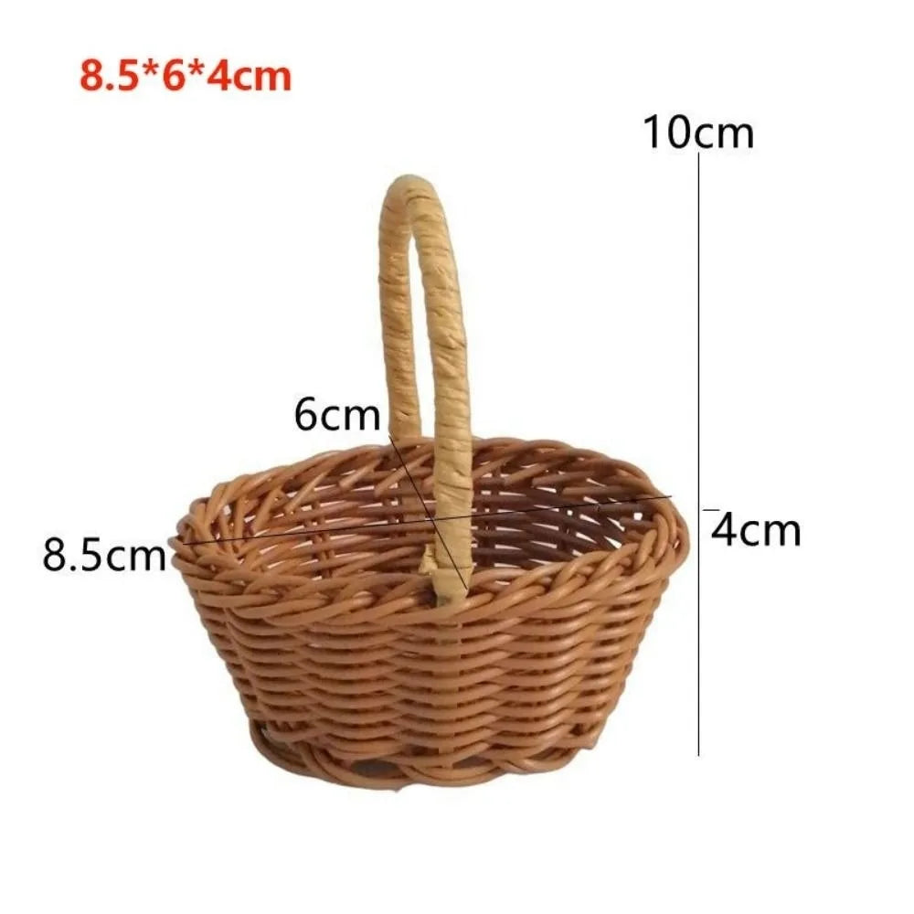A brown handwoven rattan storage basket with a handle, shown from above.