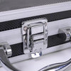 A silver aluminum tattoo machine storage box with reinforced corners and a metal latch is shown.